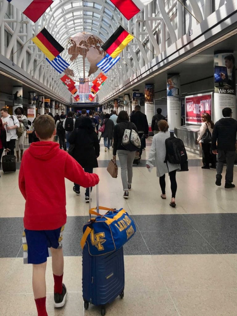 child walking through airport