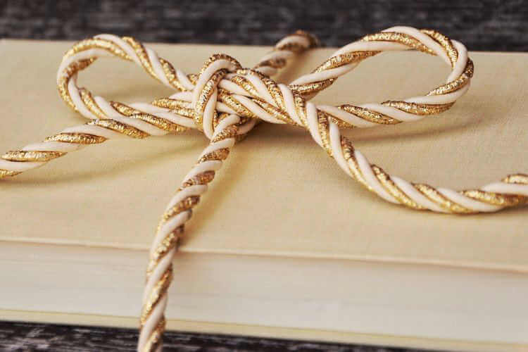 book wrapped with ribbon