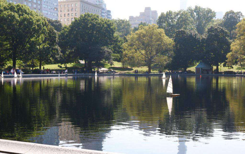 Lake in Central Park with small sailboats.