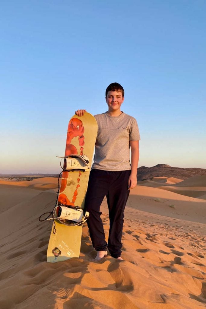 Morocco sand boarding with teens